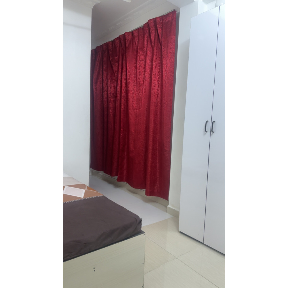 Renting well ventilated a/c room with attached toilet from 2 room apartment — Malé — Henveiru